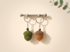 Woodland amigurumi keychains: orange fox with cream chest, round owl with big eye patches, spotted mushroom.