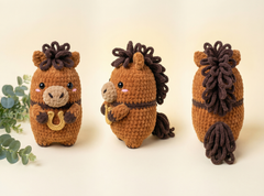 Three views of a crocheted plush horse toy in warm brown and dark brown, shown on a light cream background with a small eucalyptus sprig at left.